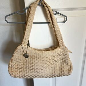 The SAK Lola Woven Shoulder Bag Baguette Purse.